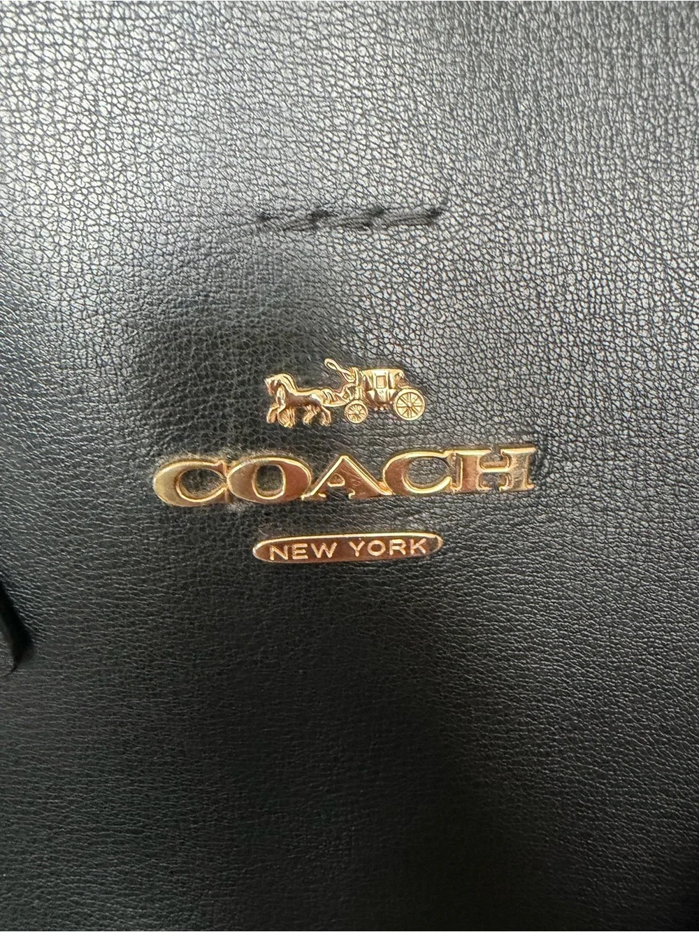 COACH Black Leather Tote Bag with Red Interior and Orange Tassel
